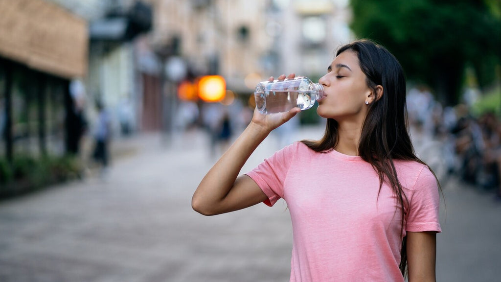 How many bottles of water should i drink a day? [ 2024 Guide]